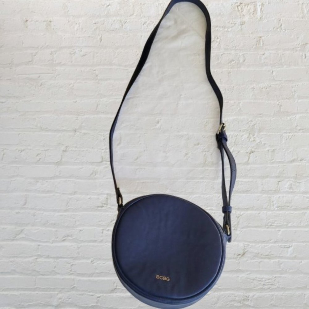 Round BCBG purple cross body purse